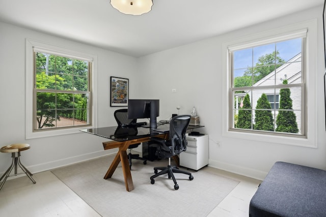 office area featuring baseboards