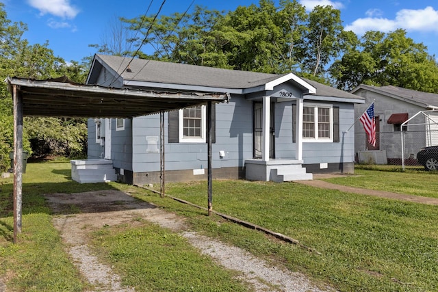 bungalow featuring fence, a front lawn, and crawl space