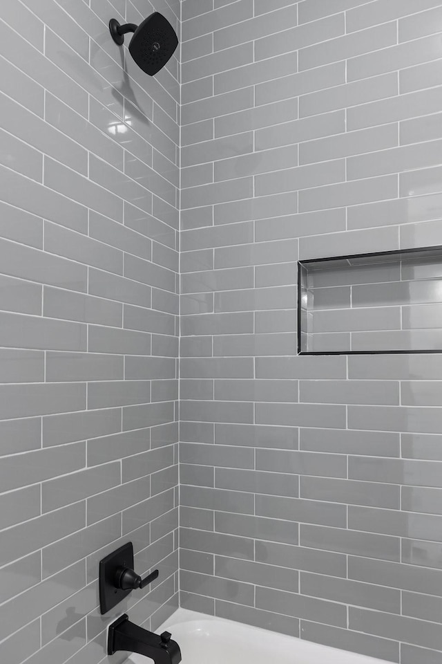 bathroom with shower / bath combination