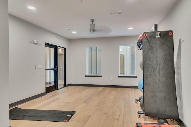 1677 54th Ave N Unit 318, Nashville, TN 37209 - workout area featuring light wood-type flooring, ceiling fan, baseboards, and recessed lighting