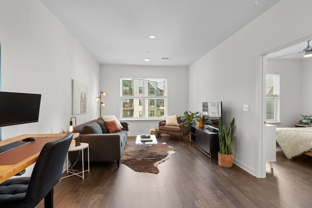 1677 54th Ave N Unit 318, Nashville, TN 37209 - living room with healthy amount of natural light, wood finished floors, baseboards, recessed lighting, and a desk