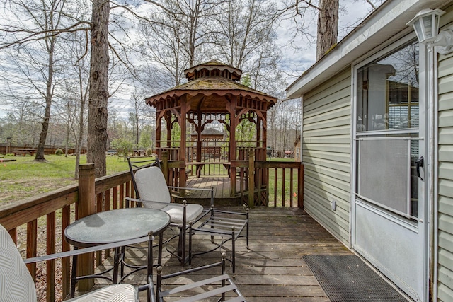 wooden deck with a gazebo