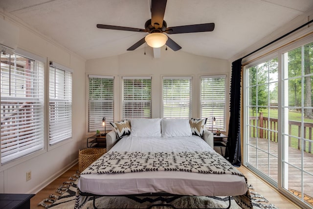 bedroom featuring lofted ceiling, access to exterior, ceiling fan, and light wood-style flooring