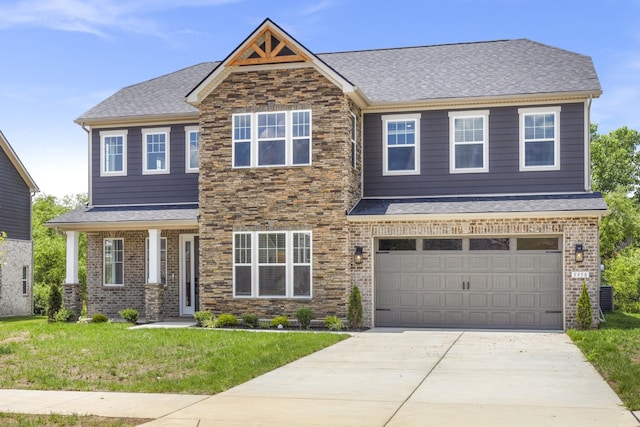 5958 Hunt Valley Dr, Spring Hill, TN 37174 - craftsman inspired home with a front lawn, concrete driveway, a shingled roof, a garage, and brick siding