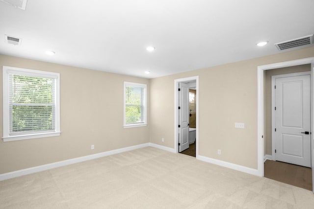 5958 Hunt Valley Dr, Spring Hill, TN 37174 - spare room with light colored carpet, healthy amount of natural light, and recessed lighting