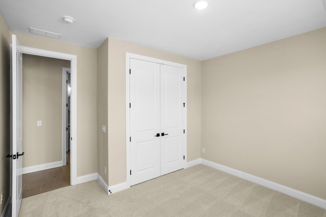 5958 Hunt Valley Dr, Spring Hill, TN 37174 - unfurnished bedroom with light colored carpet and a closet