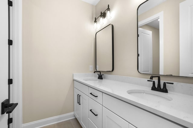 5958 Hunt Valley Dr, Spring Hill, TN 37174 - bathroom with double vanity and tile patterned floors