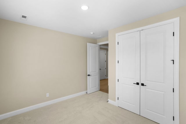5958 Hunt Valley Dr, Spring Hill, TN 37174 - unfurnished bedroom with light colored carpet, a closet, and recessed lighting