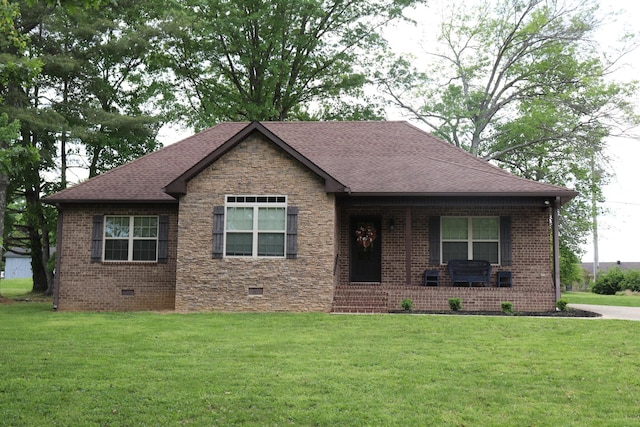 130 Lytle Dr, Hartsville, TN 37074 - view of front facade with a front lawn, covered porch, crawl space, and roof with shingles