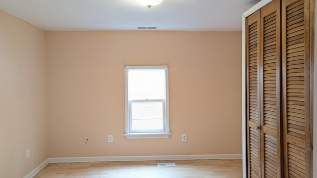 624 W Eastland St, Gallatin, TN 37066 - unfurnished bedroom with a closet, light wood-type flooring, and baseboards