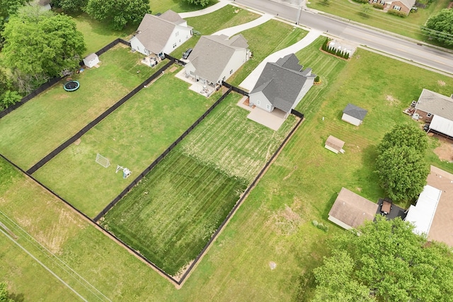 birds eye view of property with a residential view