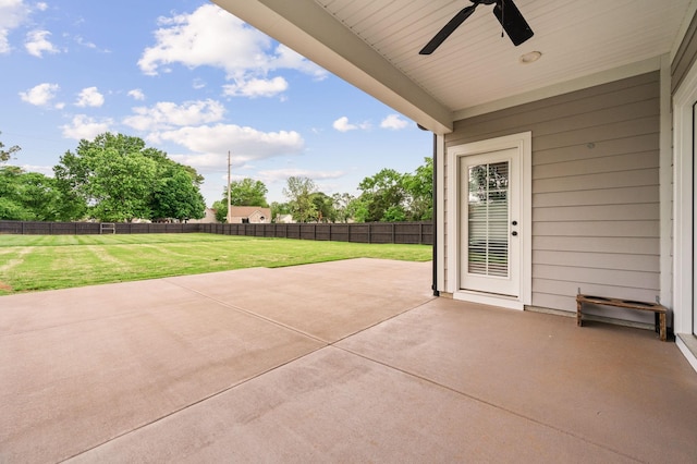 view of patio featuring a fenced backyard and ceiling fan