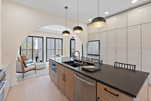 736 Douglas Ave, Nashville, TN 37207 - kitchen with a sink, freestanding refrigerator, light wood-type flooring, recessed lighting, and dishwasher