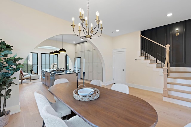 736 Douglas Ave, Nashville, TN 37207 - dining space with light wood-type flooring, recessed lighting, stairway, arched walkways, and baseboards