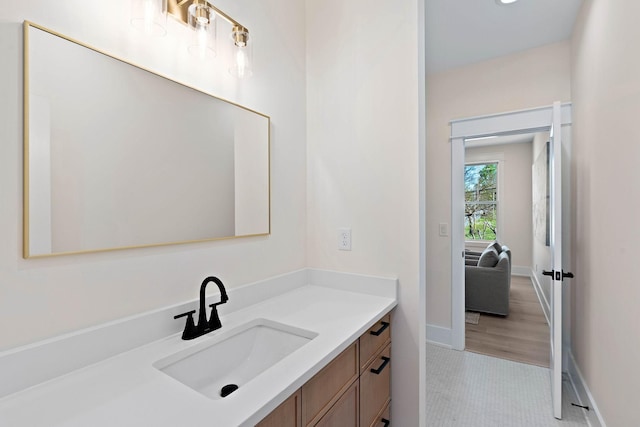 736 Douglas Ave, Nashville, TN 37207 - bathroom featuring baseboards, tile patterned floors, and vanity