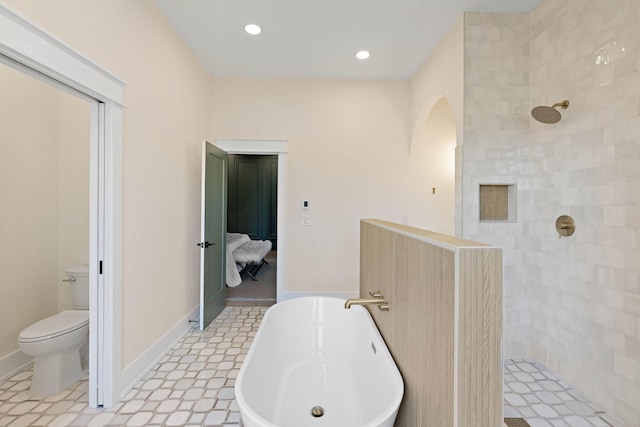 736 Douglas Ave, Nashville, TN 37207 - bathroom featuring toilet, walk in shower, tile patterned floors, connected bathroom, and a freestanding tub