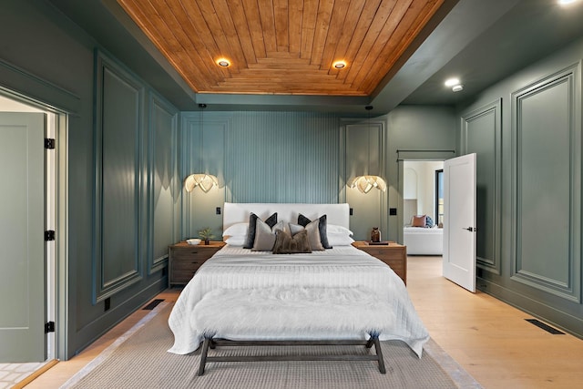 736 Douglas Ave, Nashville, TN 37207 - bedroom with a decorative wall, light wood-type flooring, visible vents, recessed lighting, and wooden ceiling
