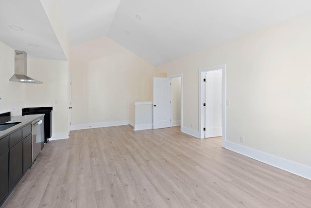 736 Douglas Ave, Nashville, TN 37207 - unfurnished living room featuring baseboards, light wood-style floors, and vaulted ceiling