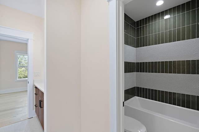 736 Douglas Ave, Nashville, TN 37207 - full bathroom with toilet, wood finished floors, baseboards, vanity, and recessed lighting