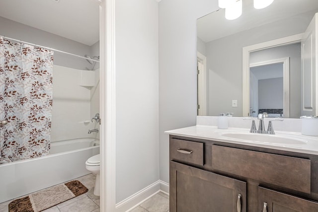 5509 Dana Ln, Franklin, TN 37064 - bathroom featuring tile patterned floors, toilet, vanity, and shower / tub combo