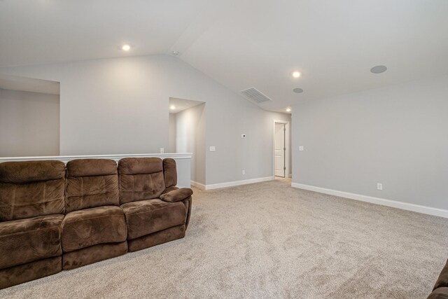 5509 Dana Ln, Franklin, TN 37064 - living area featuring vaulted ceiling, light carpet, baseboards, and recessed lighting