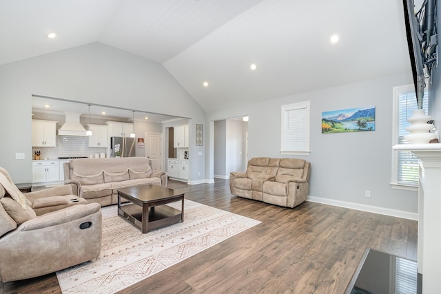 5509 Dana Ln, Franklin, TN 37064 - living room with wood finished floors, recessed lighting, baseboards, and high vaulted ceiling
