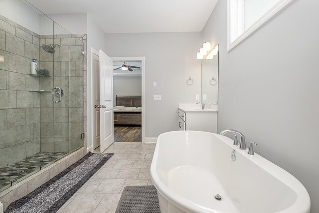 5509 Dana Ln, Franklin, TN 37064 - full bath featuring ensuite bath, a stall shower, vanity, a freestanding tub, and ceiling fan
