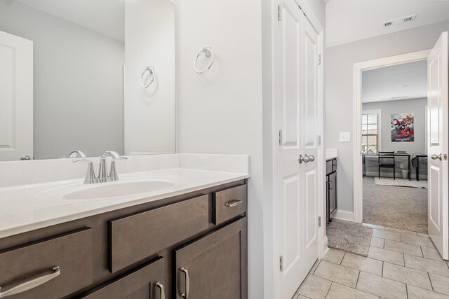 5509 Dana Ln, Franklin, TN 37064 - bathroom featuring vanity, tile patterned flooring, and baseboards