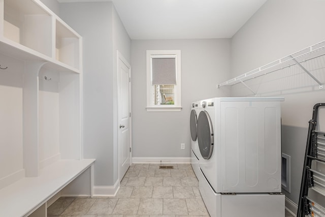 5509 Dana Ln, Franklin, TN 37064 - clothes washing area featuring washing machine and clothes dryer and baseboards