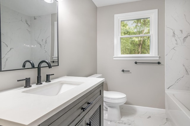 bathroom featuring toilet, baseboards, marble finish floor, and vanity