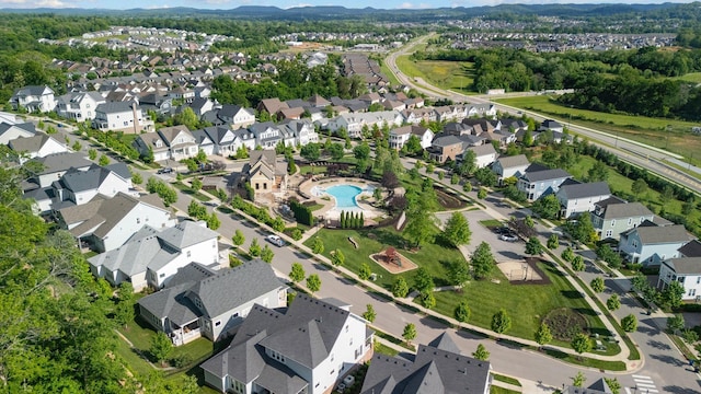 bird's eye view featuring a residential view and a mountain view
