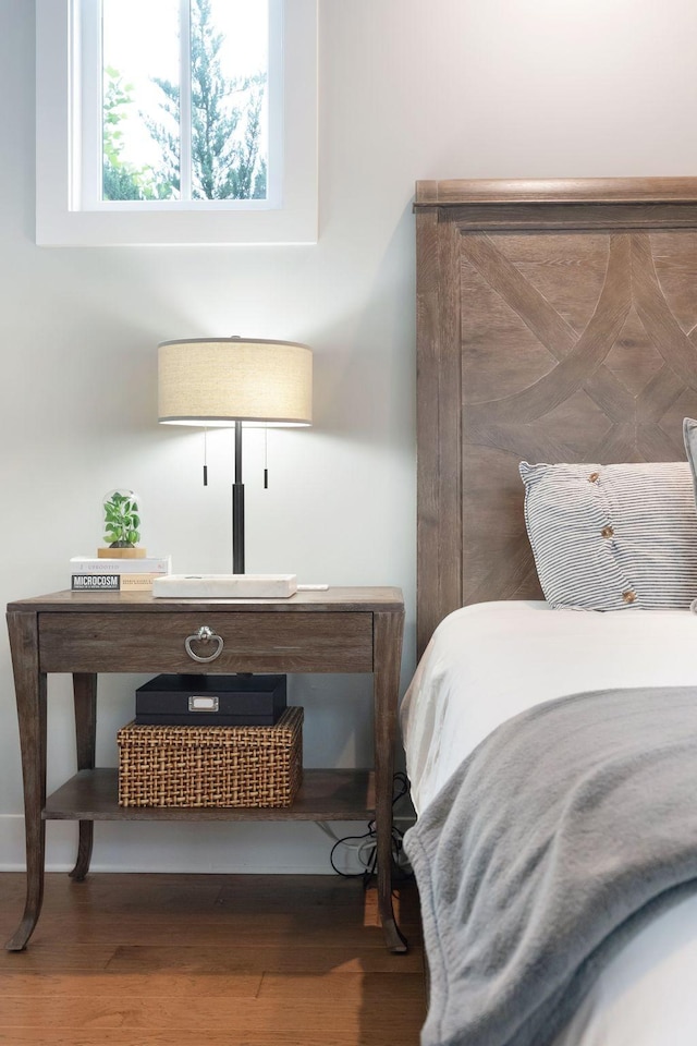 bedroom featuring wood finished floors