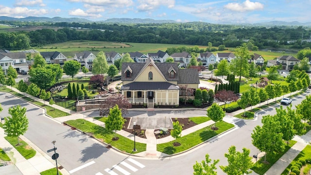 bird's eye view featuring a mountain view and a residential view