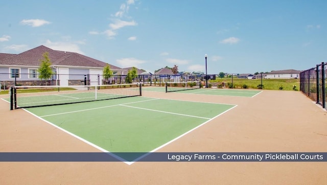 view of sport court with fence and community basketball court