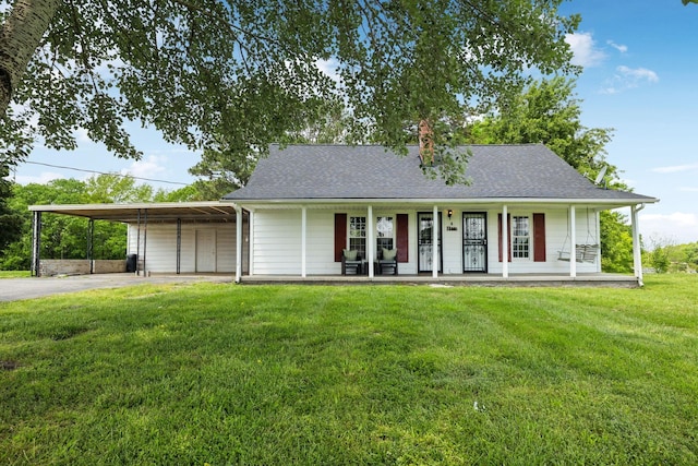 view of front of home with a porch, aphalt driveway, a shingled roof, and a carport