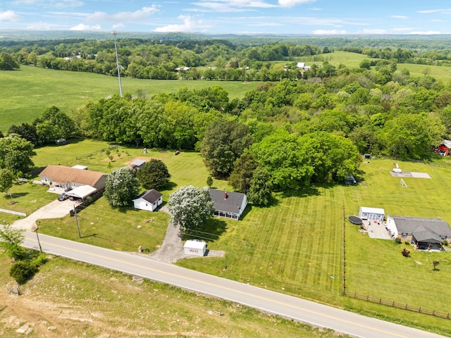 birds eye view of property with a rural view