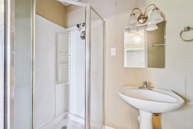 bathroom with a shower stall