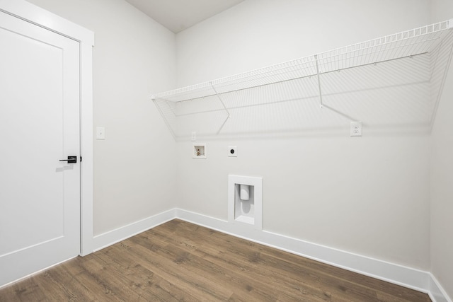 laundry room with baseboards, dark wood-style flooring, hookup for a washing machine, hookup for an electric dryer, and laundry area