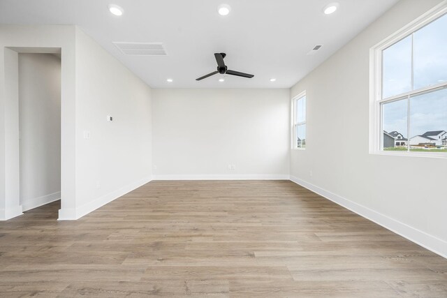 10114 Bighorn Ln, Bell Buckle, TN 37020 - spare room featuring light wood-style floors, baseboards, a ceiling fan, and recessed lighting