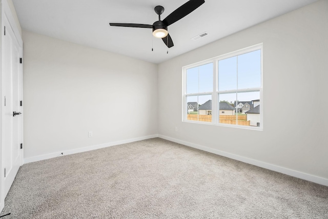 10114 Bighorn Ln, Bell Buckle, TN 37020 - carpeted empty room with baseboards, a ceiling fan, and visible vents