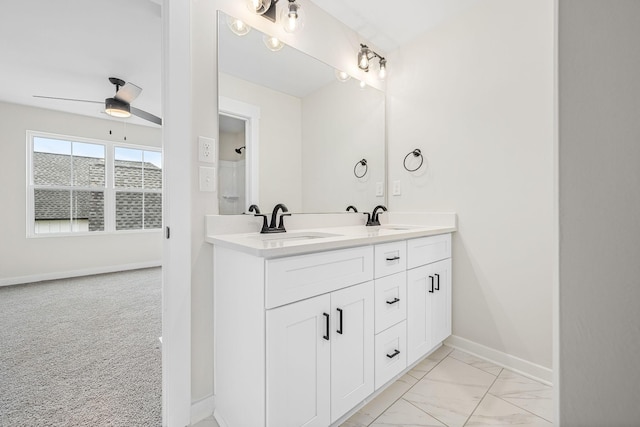 10114 Bighorn Ln, Bell Buckle, TN 37020 - full bathroom with a sink, double vanity, a ceiling fan, and marble finish floor