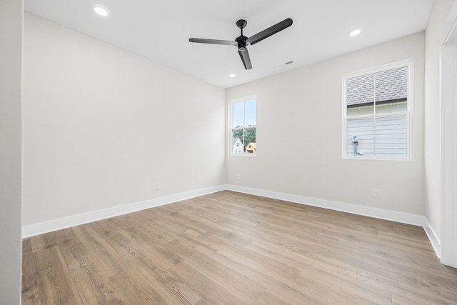 10114 Bighorn Ln, Bell Buckle, TN 37020 - unfurnished room featuring light wood-style flooring, baseboards, a ceiling fan, and visible vents