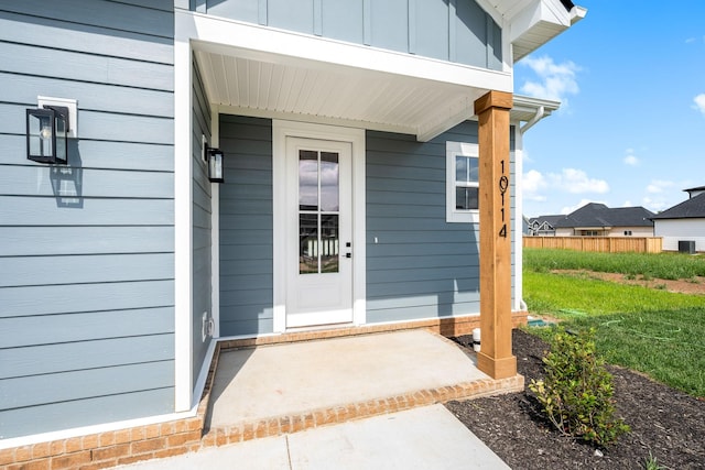 10114 Bighorn Ln, Bell Buckle, TN 37020 - entrance to property with board and batten siding