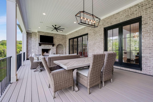 9316 Edenwilde Dr, Brentwood, TN 37027 - wooden deck featuring ceiling fan and an outdoor brick fireplace