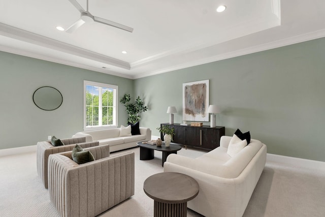 9316 Edenwilde Dr, Brentwood, TN 37027 - living room featuring a tray ceiling, a ceiling fan, and light colored carpet