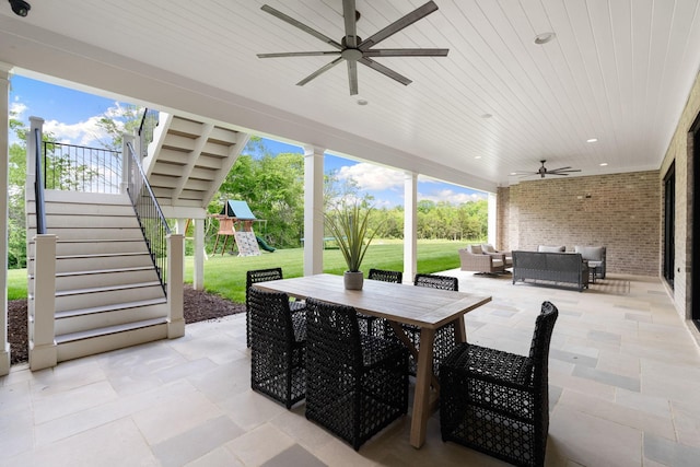 9316 Edenwilde Dr, Brentwood, TN 37027 - view of patio featuring a ceiling fan, outdoor dining space, an outdoor hangout area, stairs, and a playground