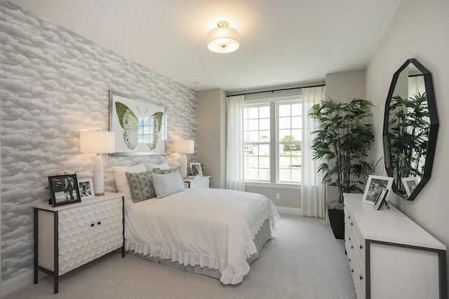 5963 Hunt Valley Dr, Spring Hill, TN 37174 - bedroom featuring baseboards, light carpet, and an accent wall