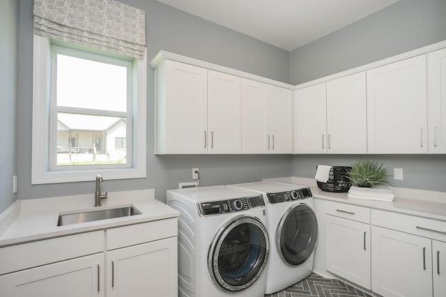 5963 Hunt Valley Dr, Spring Hill, TN 37174 - laundry room with washing machine and clothes dryer and cabinet space