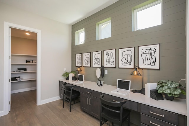 5963 Hunt Valley Dr, Spring Hill, TN 37174 - home office with wood finished floors, built in study area, and baseboards