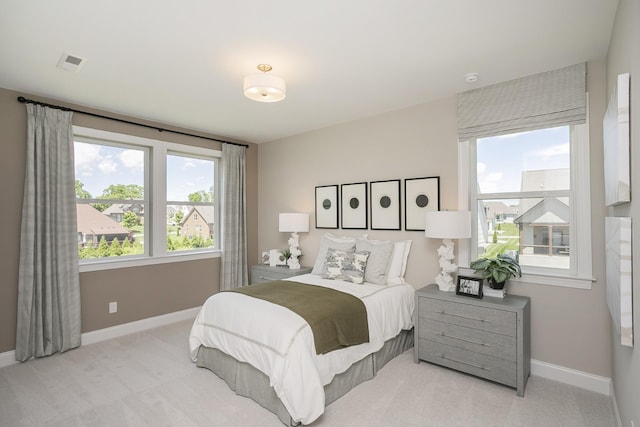 5963 Hunt Valley Dr, Spring Hill, TN 37174 - carpeted bedroom with multiple windows and baseboards